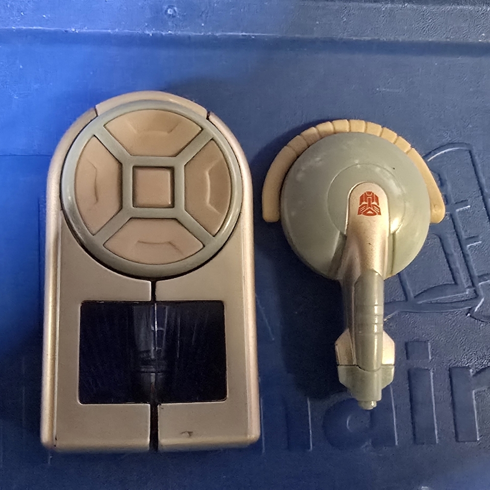 Transformers Gold and Tan Spaceship Toy